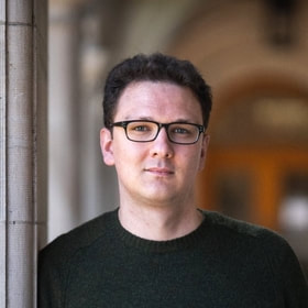 Headshot of ​Ivan Radin, PhD
